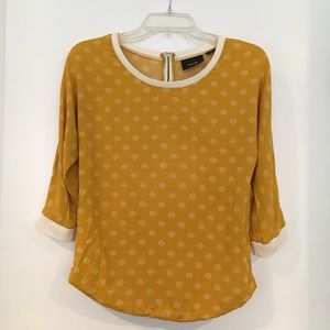 Anthropologie mustard top
